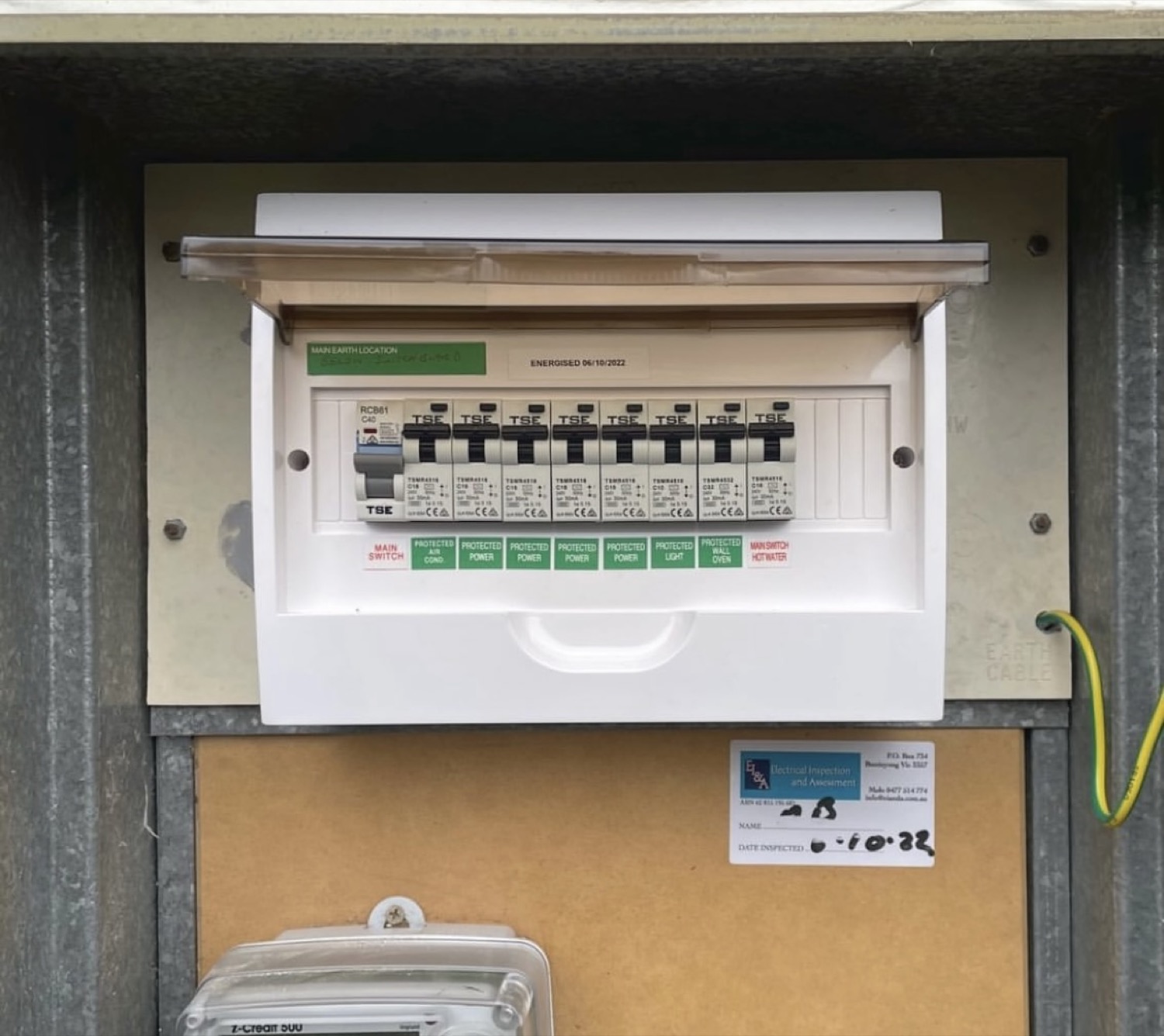 A switchboard fitted with a row of new circuit breakers